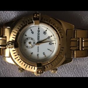 GUESS QUARTZ, Inc 1995 , gold ,JAPAN MOVT ,WATER RESISTANT